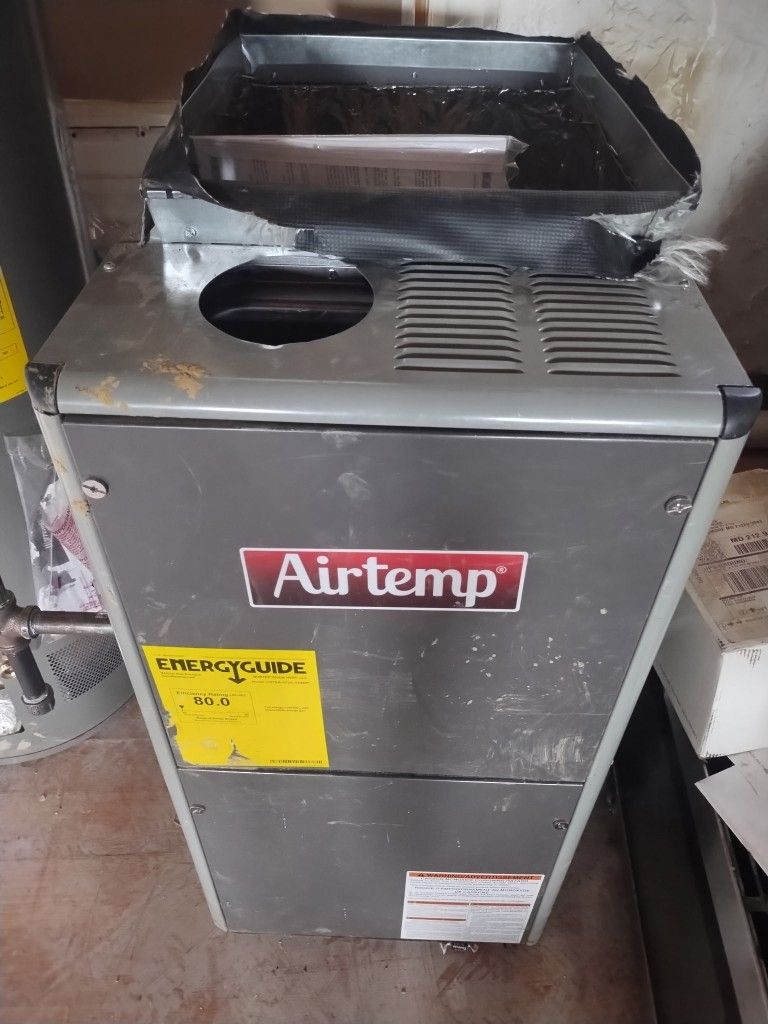 Airtemp furnace with Energy Guide label.