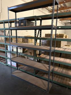 Tall freestanding shelving rack