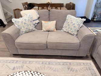 Cindy Crawford matching grey couches