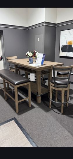 Laura Foundry mother Farmhouse 10 person bar height dinette set paid $1,900 only hair for 3 months it's in excellent condition