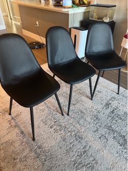 3 black Leather chairs