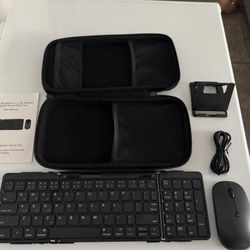 Portable keyboard with phone, stand mouse and case. Also, A plug.