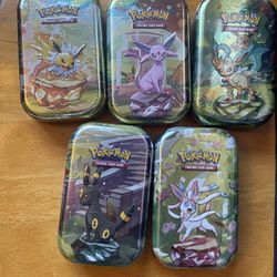 Pokémon Prismatic Evolutions Mini Tins