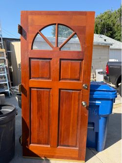 Solid wood front door, and back patio door