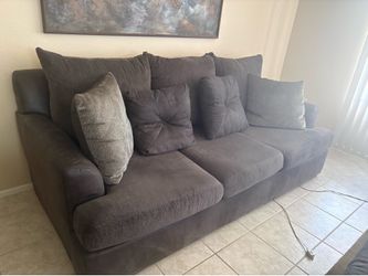 Couch and two large chairs, rug