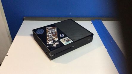 Xbox One with controllers and games