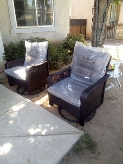 Three piece patio rocking chair set one chair has light damage as shown on the picture brand new patio rocking chair set firm price 120$ for all three