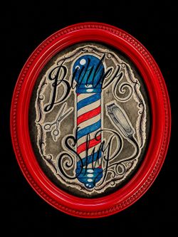 Hand-Drawn Barber Shop Artwork in Red Oval Frame – 24” x 16”
