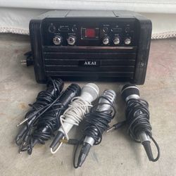 AKAI home karaoke party machine lights up RCA cables and microphones included