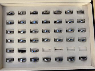 38 New Tungsten Carbide Rings – Assorted Sizes & Designs – Display Case Included
