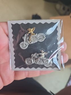 Gold and silver tone angel biker pins