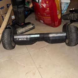                       This is a black all-terrain hoverboard, similar to models like the Gotrax SRX Pro  with Bluetooth