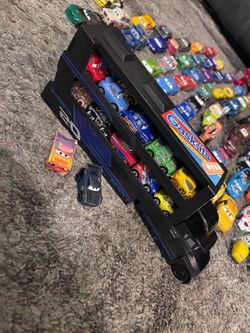 Disney Pixar Cars Hauler Truck + 22 Minis