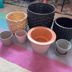 Miscellaneous small plant pots. A few little chips in some of the ceramic ones. $15 
