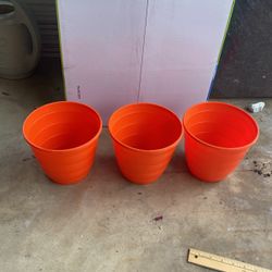 3 Orange Plastic Pots 7” Tall, 7” Wide At Top