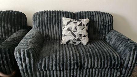Ashley’s Metallic Blue love seat
