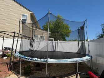 Trampoline with Safety Net – Good Condition – $125 OBO