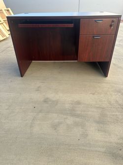 Used Small desk with pedestal and keys