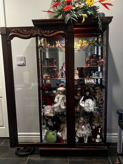 Real heavy cherry wood 4 tiers g glass shelves with 2 lights.  If