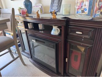 Fireplace console with glass cabinets