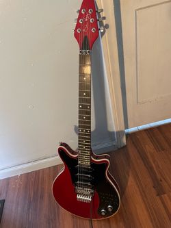 Guitarist of the band queen brian may SG Guitar