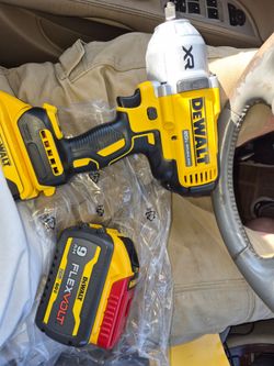 All new dewalt 20 volt max XR 3 speed impact with 5 ah battery & 9 ah flex volt battery