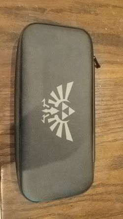 Nintendo switch zelda case with Zelda breath of the wild game and cleaner