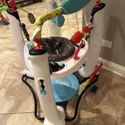 Evenflo ExerSaucer Jump and Learn Bouncer Activity Station