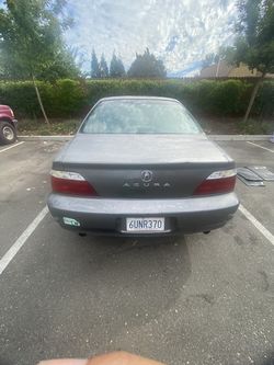 $1000 firm Acura 2003