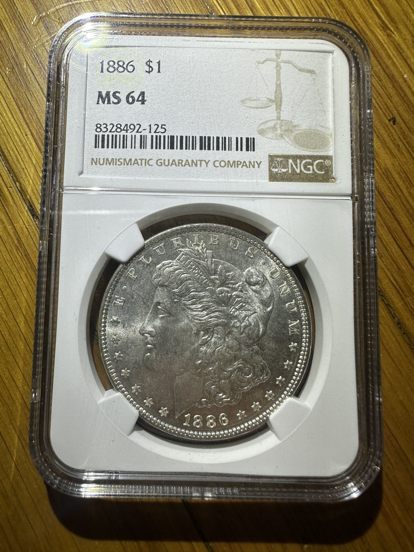 1886 Morgan Silver Dollar NGC MS64