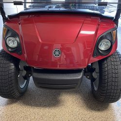 Red Yamaha (gas powered) Golf Cart