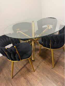 Modern round glass dining table set with 4 black velvet chairs - excellent condition