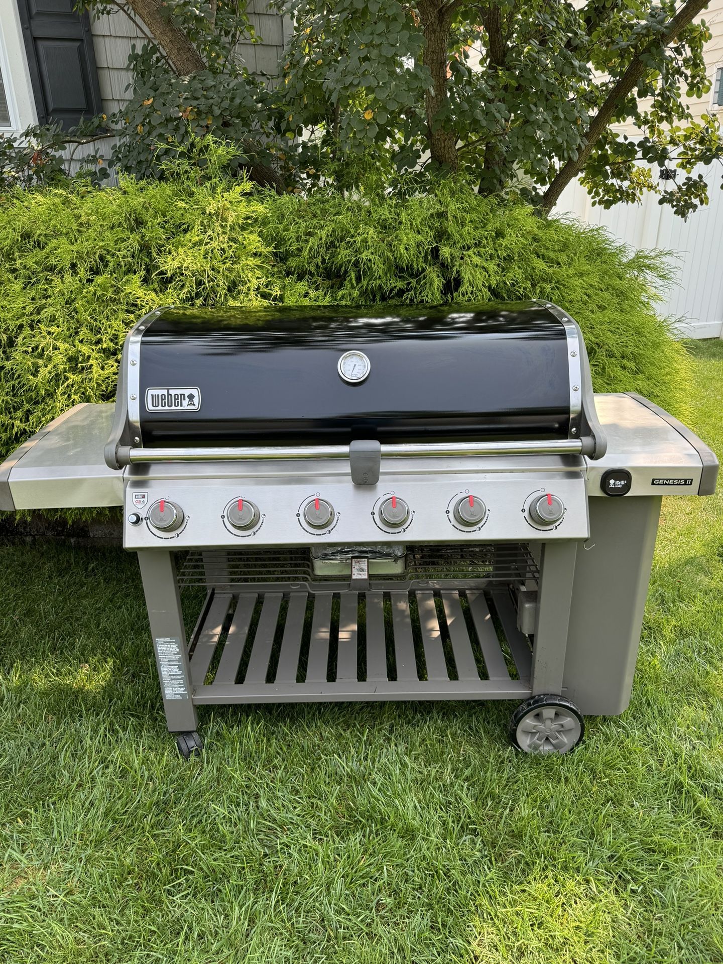 Weber Genesis II E-610 Black 6-Burner Propane Grill with griddle, rotisserie and cover