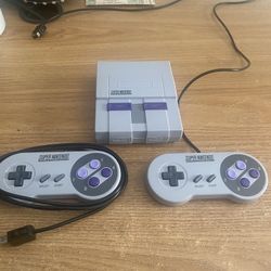 Super Nintendo Mini With 21 Built In Classic Games  And 2 Controllers 