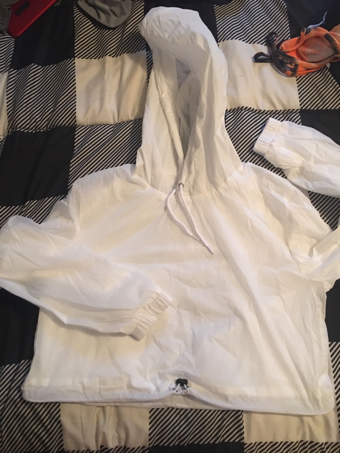 1 left..crop top rain jacket. And all black jeans size 27