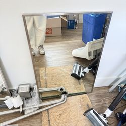 Two Bathroom Mirrors And One Set Of grab Bars 