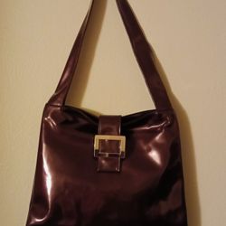 "NWT" Guess Burgundy Leather Type Purse.