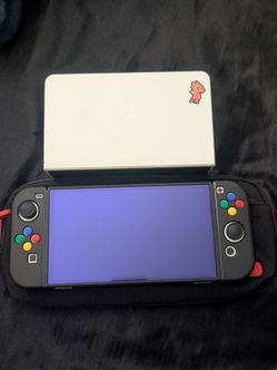 Nintendo Switch OLED Console + Dock