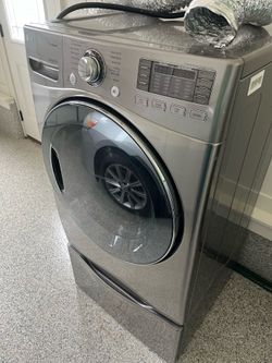 LG Washer/Dryer pair with storage bins
