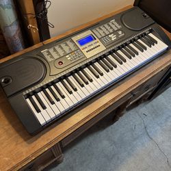 61 key digital piano and piano books