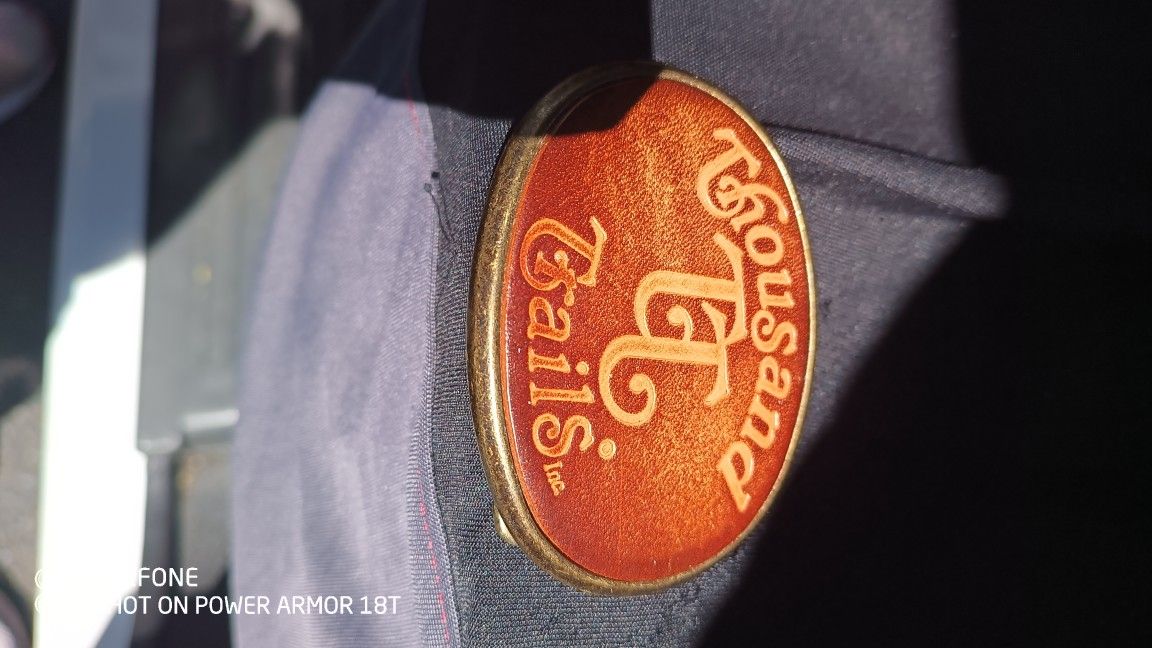 A,BELT BUCKLE THOUSAND TRAILS ONLY ONE AVAILABLE