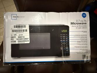 Brand New Mainstays Microwave 0.7 Cu. Ft. - $40