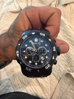 Invicta black chronograph watch