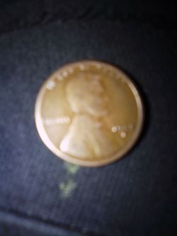1925 s penny with a l on the rim