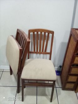 Two folding dinet chairs