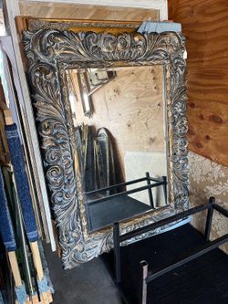 Ornate artist design golden solid wood  bevelled mirror 46 x 62.. $300