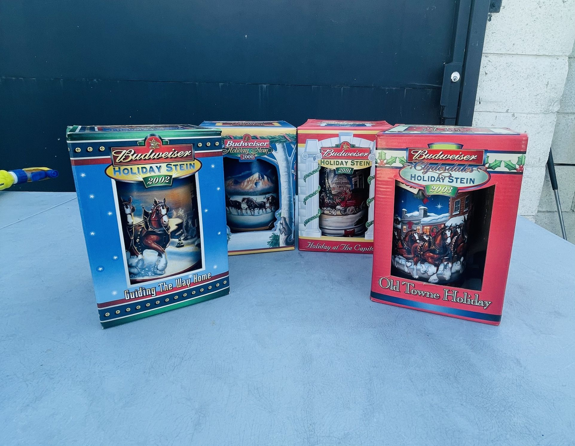 Perfect Gift For The Stein Collector Or For Your Man cave Budweiser Holiday Steins 2000/2001/2002/2003 Collection Four For $35