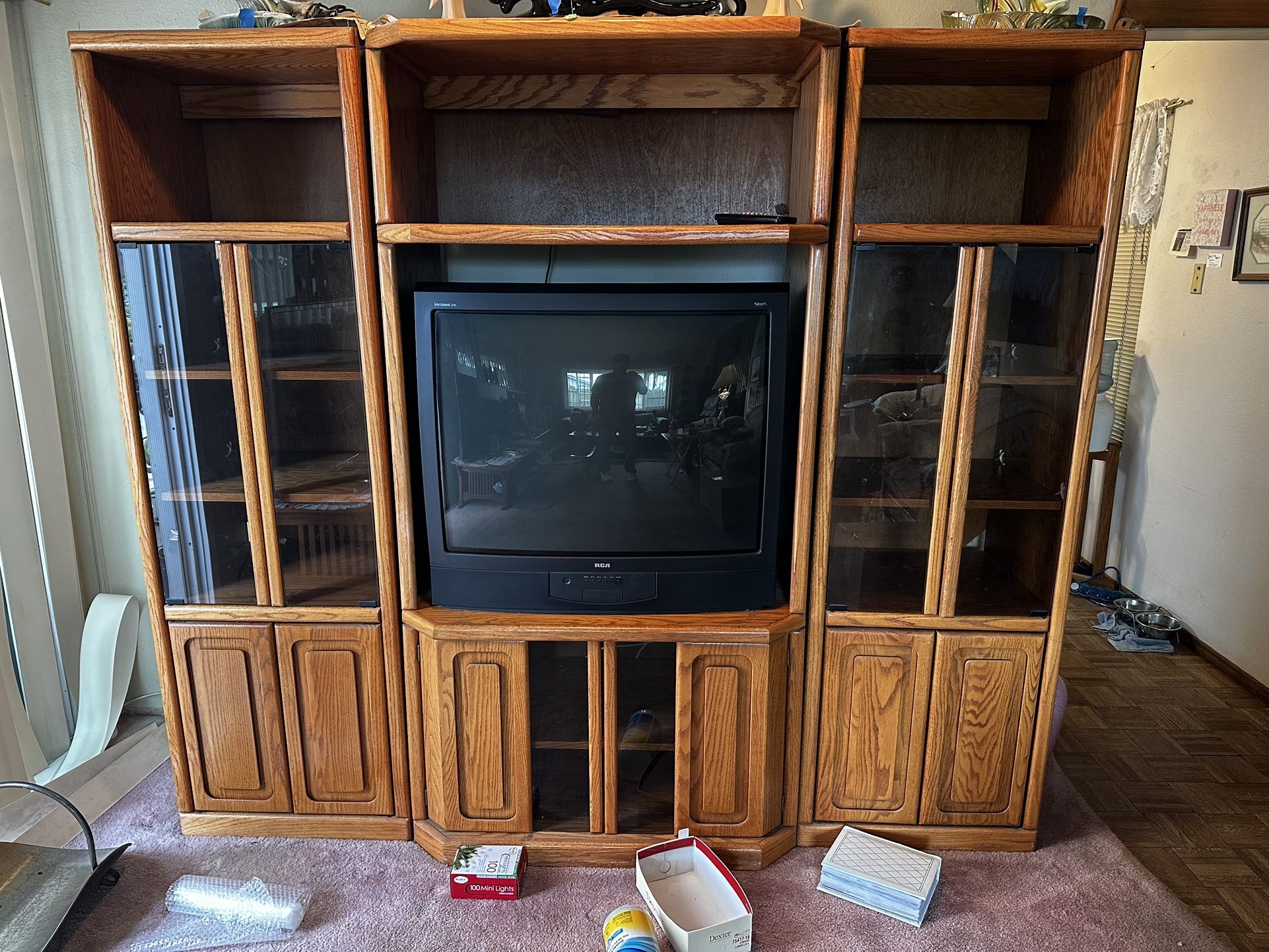 solid oak entertainment center with TV Real Wood