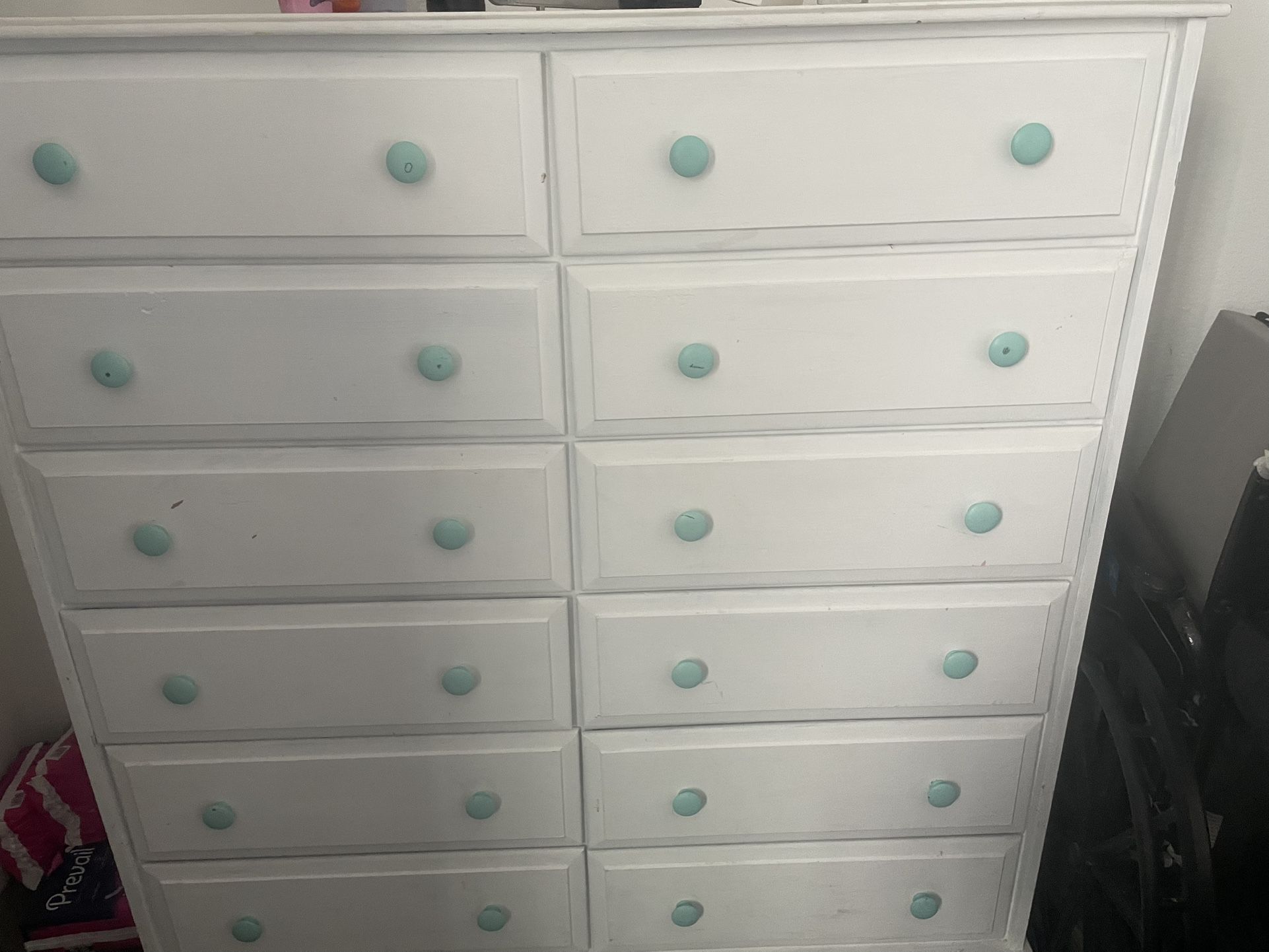 White dresser teal Knobs