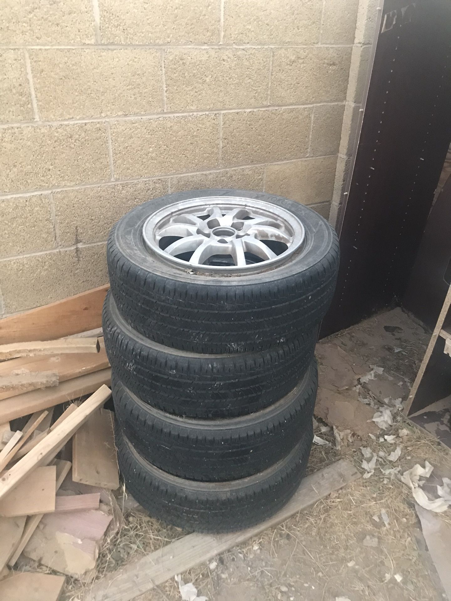 Set Of (4) With The Rims P205/60R16...Satisfaction Guarantee (see description)